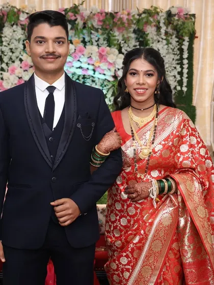 A classic couple portrait from the reception, showing her beautiful smile and elegant makeup.