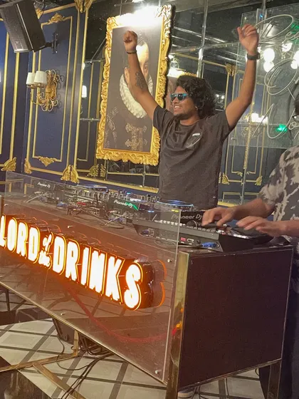 Hands up for a great night. Celebrating with the crowd after a successful set at Lord of the Drinks.