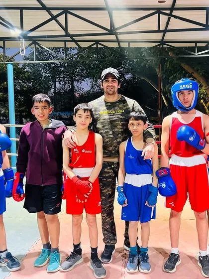 My boys ready for a sparring session. We ensure they are properly equipped and mentally prepared before stepping into the ring.