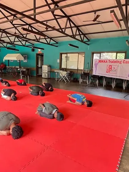 Respect and humility are core values in martial arts. Our yoga sessions often conclude with the Child's Pose (Balasana), a resting posture that signifies gratitude and helps students center themselves after their practice.