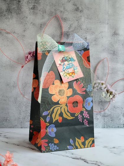 A beautiful floral Easter gift bag, a stylish way to present your Easter treats to loved ones.