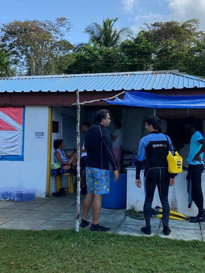 Moments from our Andaman dive trips, showing everything from gearing up at the dive center to relaxing on the boat between dives.