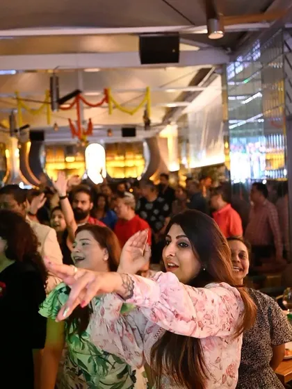 A duplicate of 93, showing the energetic crowd at Badmaash UB City.