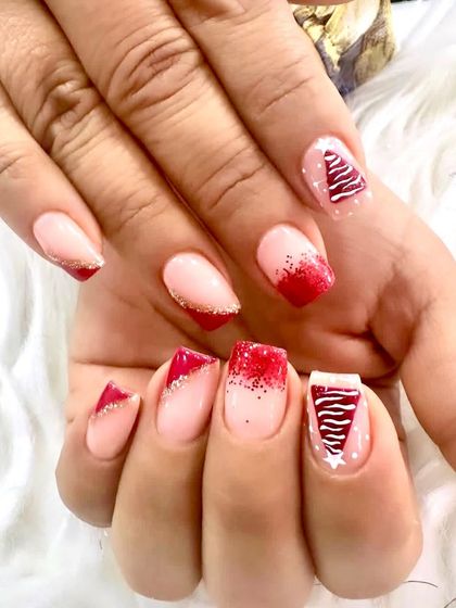 Christmas fever! This festive set features a soft nude base with bold red glitter gradients and sharp, graphic Christmas tree accent art.