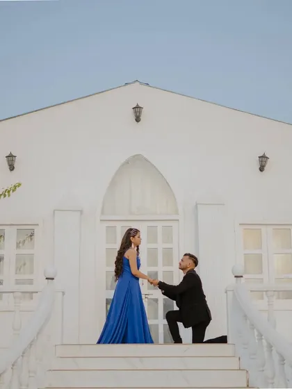 A romantic proposal on the steps of the chapel set. This is a perfect way to recreate or imagine a special moment in a beautiful, controlled environment.