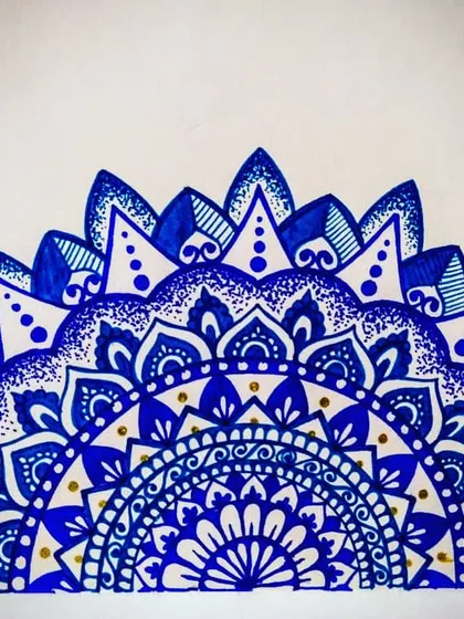 A semi-mandala from my daily sketchbook, this time exploring different shades of blue with small gold accents. Even a quick scribble can be a moment of peace in a busy day.