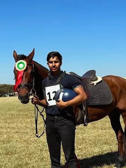 One of our young riders with his horse after a win at the Junior National Equestrian Championship. The bond between horse and rider is the foundation of every victory.