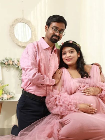 Happiness is on the way. This couple chose a lovely boho-chic setup in my studio, complete with a beautiful pink gown, to celebrate their journey to parenthood.