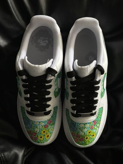 A front view of the flower field custom sneakers.