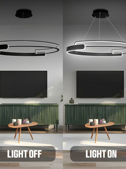 A modern black ring chandelier, shown both off and on. This minimalist design is perfect for a contemporary living room, providing a clean look and bright, even illumination.