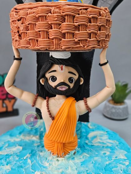 A close-up of the Vasudeva figurine, showing the detailed texture of the basket and his determined expression as he crosses the river.
