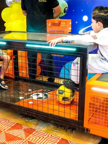 Our mini table football game is a modern, enclosed version of foosball, perfect for two players to go head-to-head.