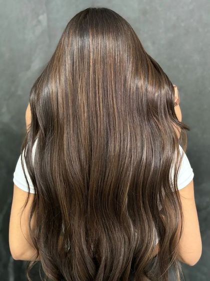 A back view of the creative hair, showing its incredible length and health.
