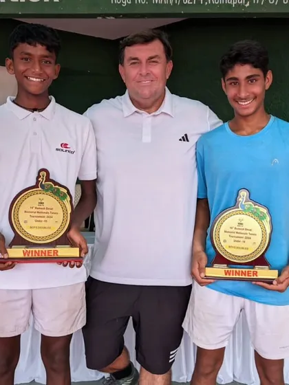 Tavish and his partner with our coach after winning the doubles title at the AITA U16 Nationals.