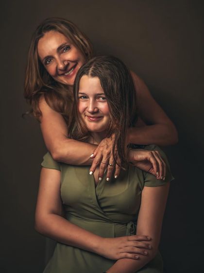The genuine laughter and love between a mother and her teenage daughter. This portrait of Petra and Maja is a beautiful, candid moment that shows the joy and friendship that can exist in their complex and evolving relationship.