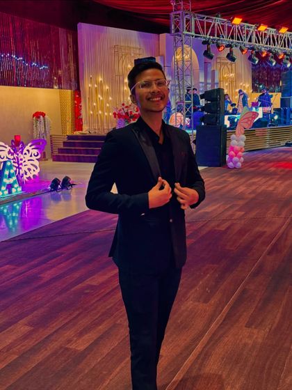 At a wedding reception, ready to entertain. The grand setting is a beautiful backdrop for creating magical memories for the guests.