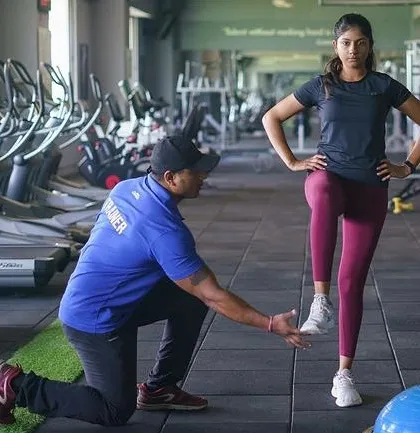 Form comes first, always. Here, I am assessing a client's single-leg balance and stability. This simple test tells me a lot about core strength, coordination, and potential muscle imbalances. By identifying these details, I can create a program that prevents injury and builds a truly strong foundation.