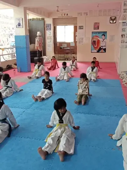 The 4 pm batch at our Chellikere dojang during a stretching exercise.