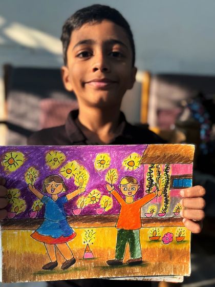 A 3rd-grade student's drawing captures the excitement of Diwali, with children enjoying firecrackers and lights. We learn to draw human figures in action to tell a story.