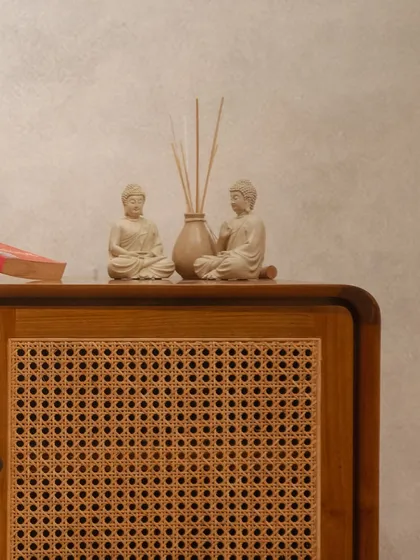 A styled shot of the 'Kayo' cabinet, demonstrating how it serves as a beautiful surface for displaying decor.
