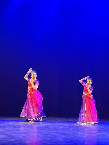 Our Kathak students light up the stage in a vibrant performance. We believe the `rangmanch` (stage) is where confidence is born, and we ensure every student experiences the thrill of performing.
