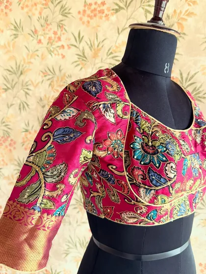 Kalamkari fabrics tell such a beautiful story. I used this vibrant, hand-painted fabric to create a statement blouse that can be paired with many different sarees.