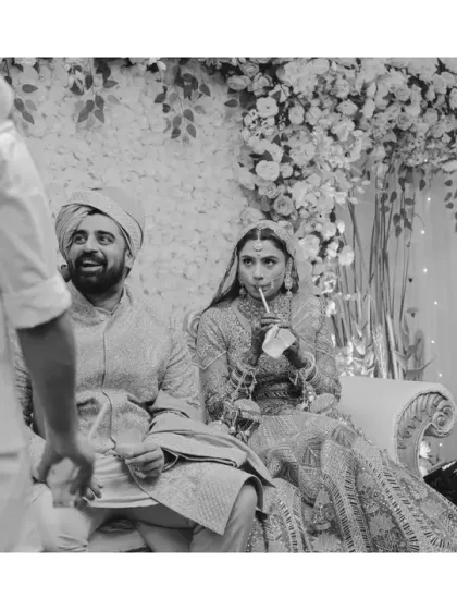 Candid photography at its finest. The bride takes a quiet sip of her drink after the ceremonies are over. This unscripted, in-between moment tells a story of relief and quiet celebration.
