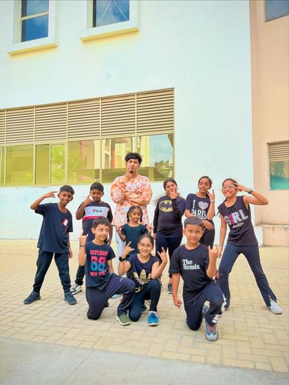 Getting ready to create something new with my fantastic kids' batch. This is the moment before the music starts, full of excitement for the dance routine we are about to learn.