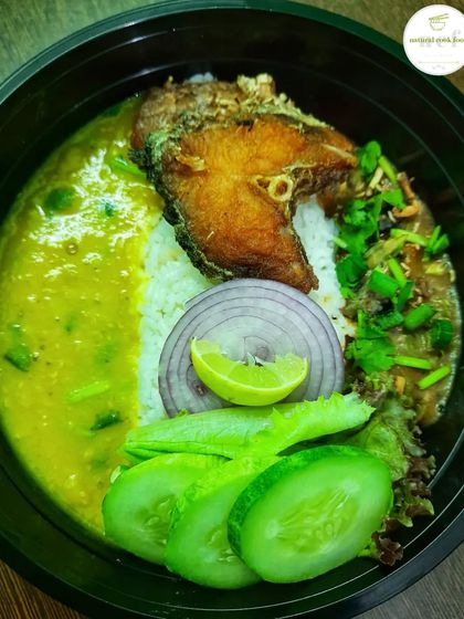 A customized 5-in-1 simple rice bowl with fried fish, eromba, and dal, perfect for an economical and filling meal.