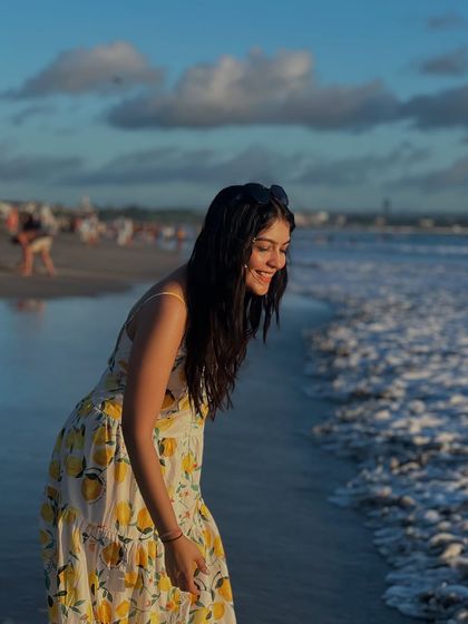 Enjoying the waves in Bali. The light fabric of this dress makes it ideal for walking along the shore.
