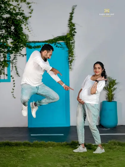 Maternity shoots should be fun. We encourage couples to be themselves, resulting in playful and energetic photos like this one that truly capture the joy and excitement of waiting for your little one.