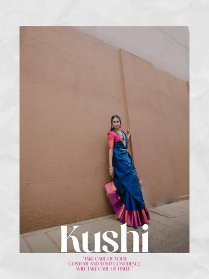 This is an example of an editorial-style portrait, perfect for a model's portfolio. The combination of a vibrant traditional saree against a minimalist urban background creates a striking, modern look.