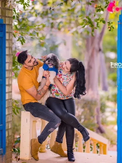 Your pets are family, and I love including them in our sessions. This is a candid, joyful moment from a couple's photoshoot with their adorable dog. Capturing these real, happy interactions is what makes a family portrait session special.