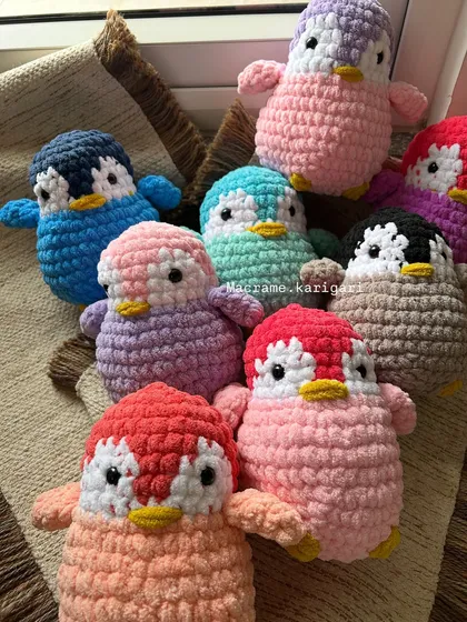 A whole waddle of handmade penguins ready to find new homes! We make these chunky yarn plushies in a rainbow of colors, so you can pick the perfect one. They are incredibly soft, making them wonderful sensory toys for kids or just a cheerful desk decoration.