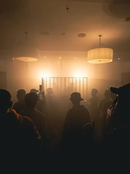 The view from the crowd at one of our music events in The Park Ballroom. The space is filled with haze and dramatic lighting, creating an immersive atmosphere where the music is the only thing that matters.