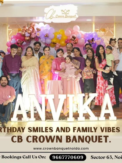 Birthday smiles and family vibes. A large group photo in front of a personalized light-up name sign and balloon arch shows how our spacious hall is perfect for gathering all your loved ones.