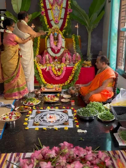 The sacred space created for the pooja, filled with flowers, offerings, and devotion. This is how we create a temple within our own homes.