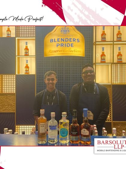 Our team showcasing the premium spirits offered at the Filmfare Awards, including Absolut Elyx, Malfy Gin, and Blender's Pride.