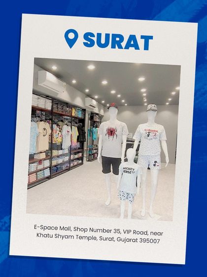 Announcing my new store in Surat, with the address and a photo of the storefront.