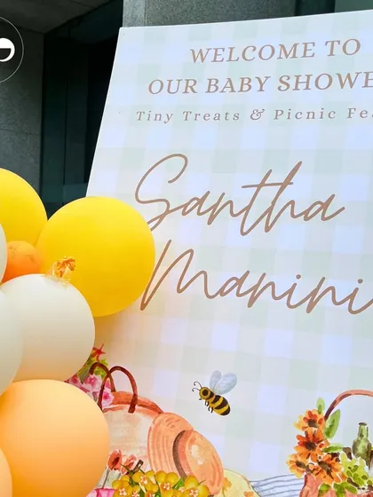 Welcome to the barnyard bash. This cute welcome sign, with its gingham print and picnic basket illustration, set a fun and rustic tone for this farm themed baby shower.