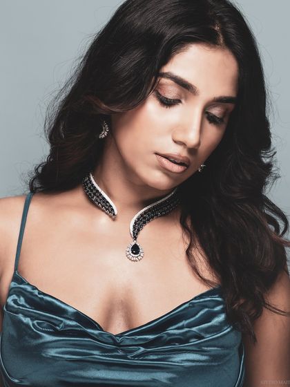 A color-toned version of a beauty shot, creating a moody and artistic feel.