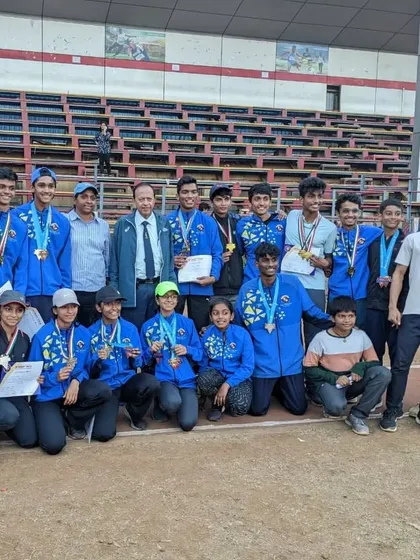 The whole team celebrating a massive medal haul at the 45th YMCA Open State Level Athletic Championship. We won multiple individual and team championships.