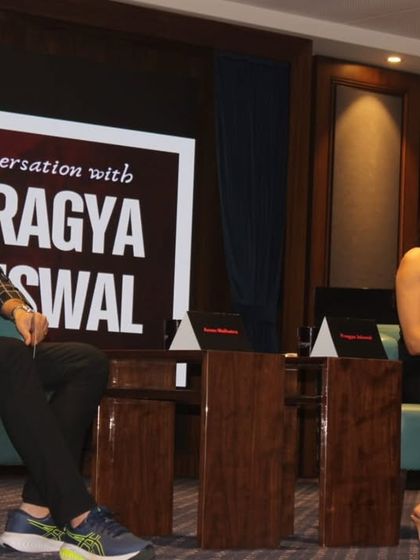 The art of moderation is in listening intently. Here, during the TEDx talk, I'm fully engaged with Pragya Jaiswal's story, which allows me to ask relevant follow-up questions.