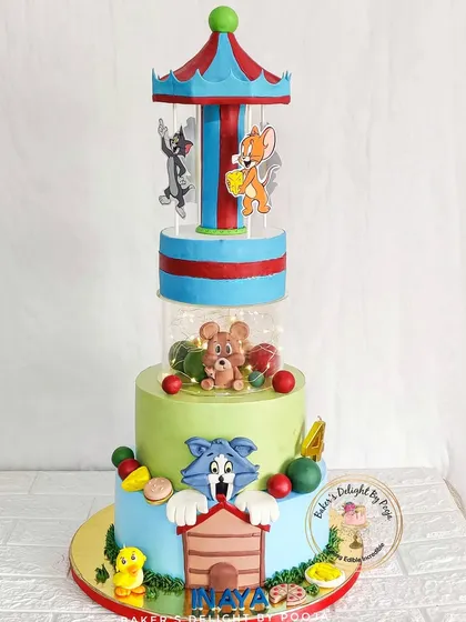 This was one of my most exciting projects: a rotating Tom and Jerry carousel cake. It combines playful, handcrafted characters with mechanical movement to create a truly interactive and memorable experience for a child's birthday party.