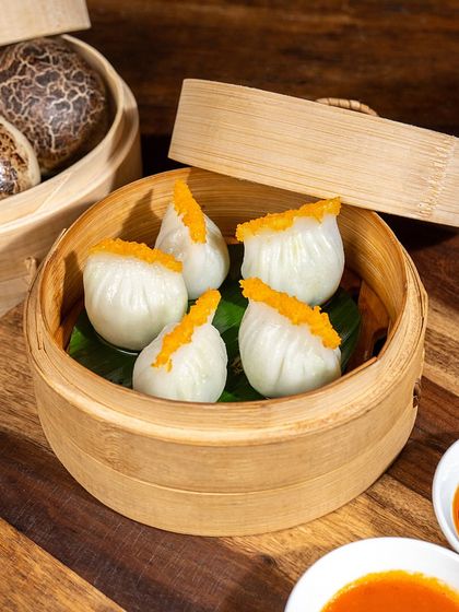 Discover the epitome of culinary elegance with our New York Cheese and Truffle dim sum. Each bite blends creamy cheese and luxurious truffle for a taste sensation like no other.