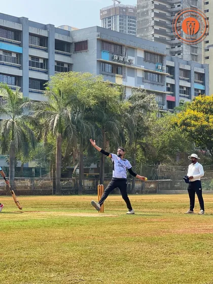 A spin bowler in action during the Parents Premier League, demonstrating a different style of attack.