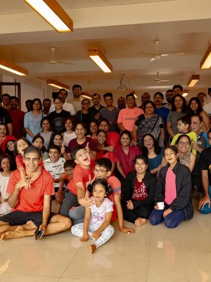 Our shala is more than a studio; it is a community. This photo from Yoga Day captures the spirit of togetherness that I cherish, with children, parents, and practitioners all sharing a moment of collective joy.