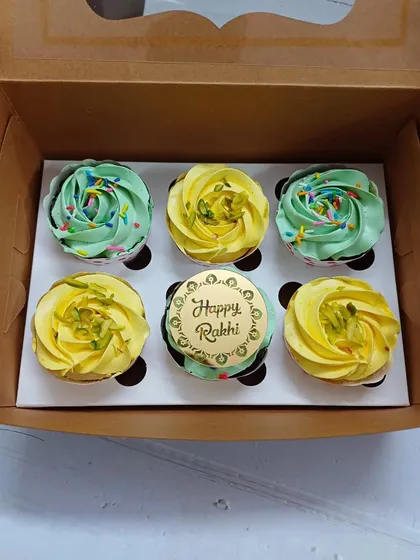 A simple and sweet gift for Rakhi, this box contains a set of six of my fresh, eggless cupcakes. I've included my popular Rasmalai flavor with pistachio garnishes and some classic vanilla cupcakes, with a special 'Happy Rakhi' topper to complete the festive look.