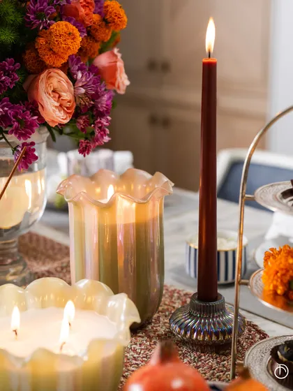 An eternal companion and often our first friend, siblings are a blessing. My Zen Lotus candle, paired with a taper candle, creates a beautiful setting to reignite memories of childhood that tug at your heartstrings.
