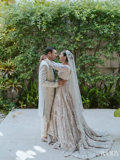 A tender embrace between the couple after their first look. We step back and let these natural, emotional moments unfold, capturing the genuine connection.
